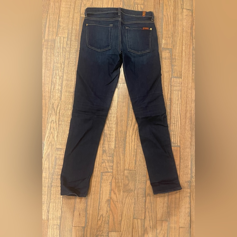 Dark blue 7 jeans.
